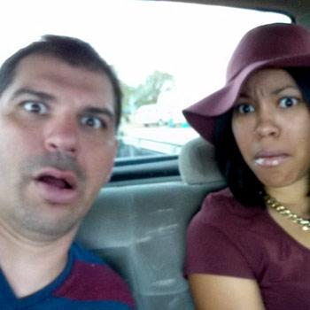Two people making silly faces
